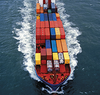 cargo ship at sea on the way to destination