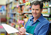 grocer with clipboard