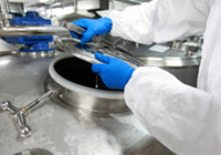 laboratory worker processing food