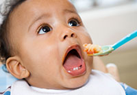 baby being spoon fed
