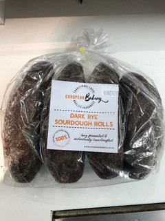 European Bakery Brand Dark Rye Sourdough Rolls 4 bread rolls in a plastic bag with a 'European Bakery' label