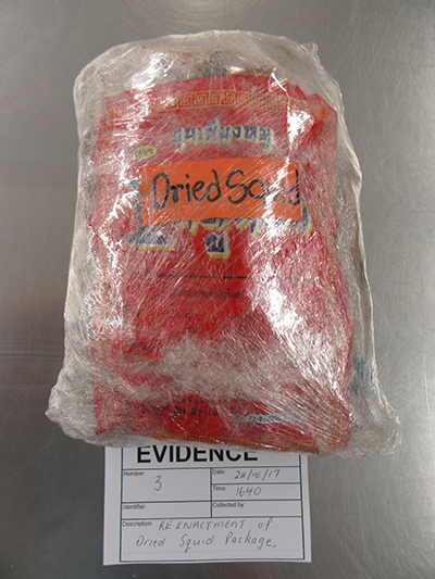 Plastic bag labelled dried squid with 2 internal bags – one containing dried squid, the other pork sausage pieces.